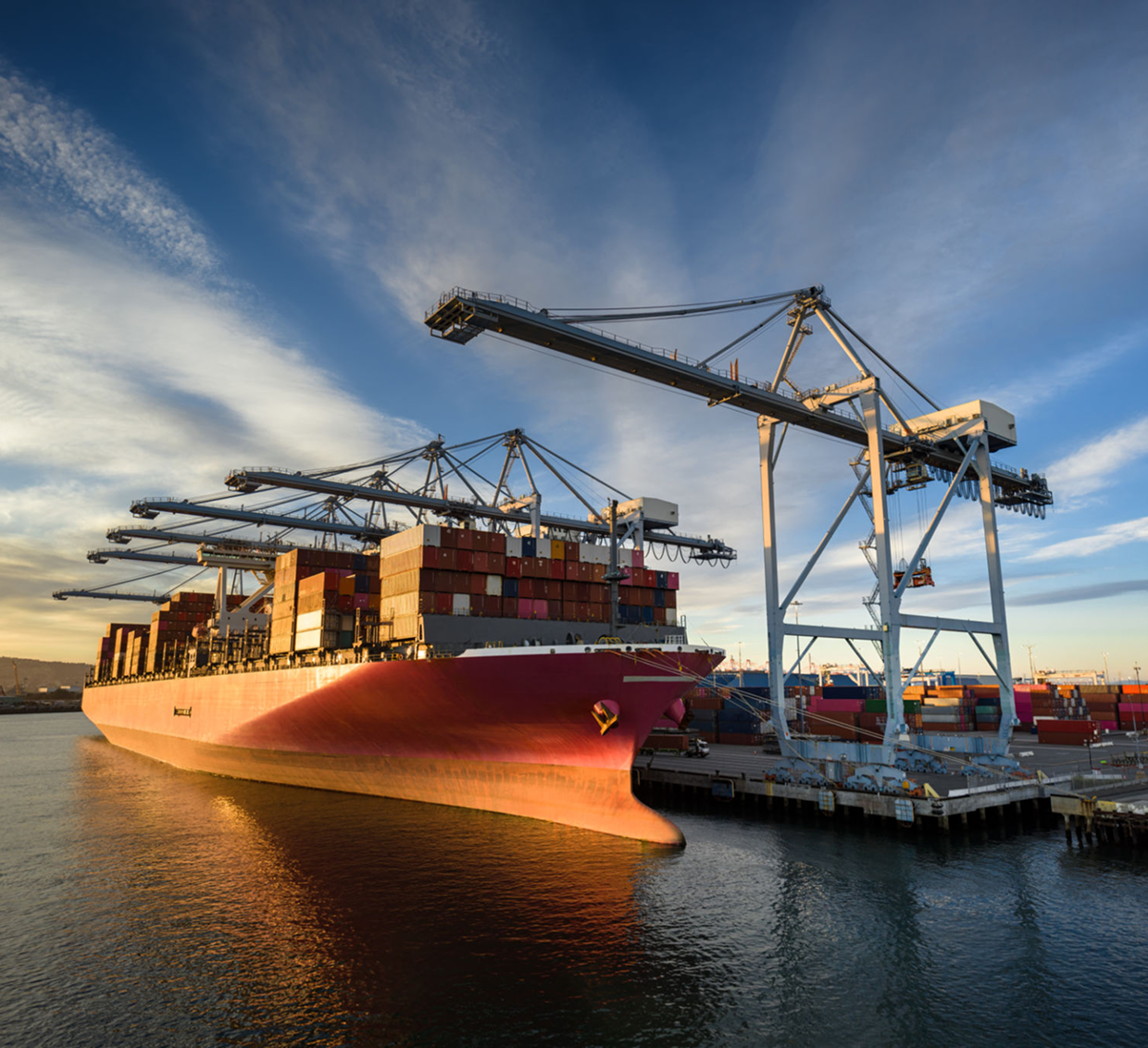 Container ship at a busy port